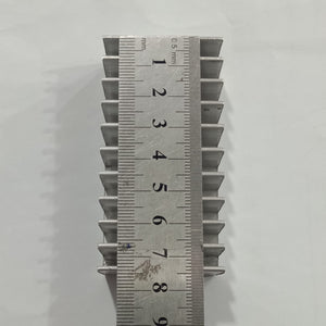 Hot Aluminum Alloy Heatsink Cooling Pad For High Power LED IC Chip Cooler Radiator Heat Sink For LED COB Light - shown from a top-down view with a metal ruler placed over it to display its dimensions in centimeters.