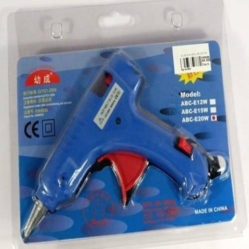 Hot Melt ABC-E15W Glue Gun For 7mm Glue Rod - shown in its original blue plastic blister packaging with a red trigger and a visible power switch.