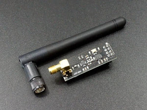 Hw-237 2.4GHz NRF24L01+pa+lna SMA Wireless Transceiver Module With Antenna - black PCB, gold SMA connector, and a detachable black antenna on a dark surface.