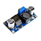 HW-411A LM2596 DC To DC Buck Converter Step Down Module Power Supply - a blue circuit board featuring a silver capacitor, a black inductor, and a small brass adjustment screw.