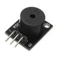 Hw-508 Small Passive Buzzer Module Applicable For Ky-006 - a black electronic component featuring a circular buzzer and a three-pin connector on a rectangular circuit board.