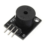 Hw-508 Small Passive Buzzer Module Applicable For Ky-006 - a black electronic component featuring a circular buzzer and a three-pin connector on a rectangular circuit board.