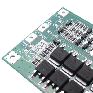 Hw-544 3s 11.1V 12.6V 60A 18650 Lithium Battery Protection Board With Equalization - a close-up of a green circuit board featuring labeled 0V, 8.4V, and Charge terminals with mounted chips.
