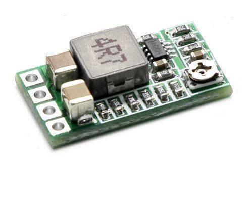 Hw-613 Adjustable DC To DC Buck Converter Module 3A - a green rectangular circuit board featuring a large inductor, a small potentiometer, and four pin holes.