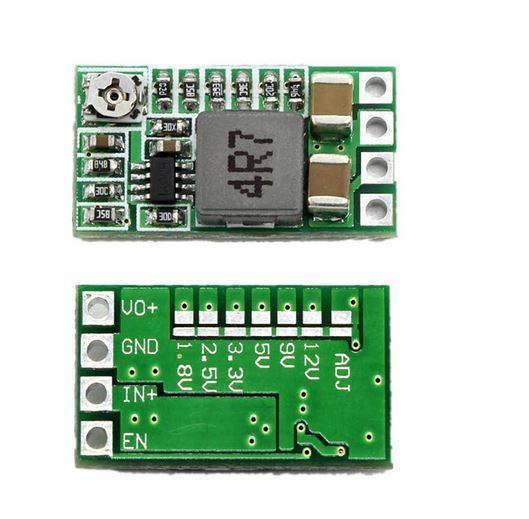 Hw-613 Adjustable DC To DC Buck Converter Module 3A - shown from the top and bottom, featuring a green circuit board, a potentiometer, and labeled pads.