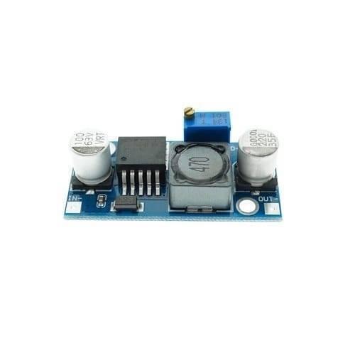 Hw 677 LM2596HV Adjustable Step Down DC To DC Buck Converter Module - a blue circuit board with two capacitors, an inductor, and a screw potentiometer.