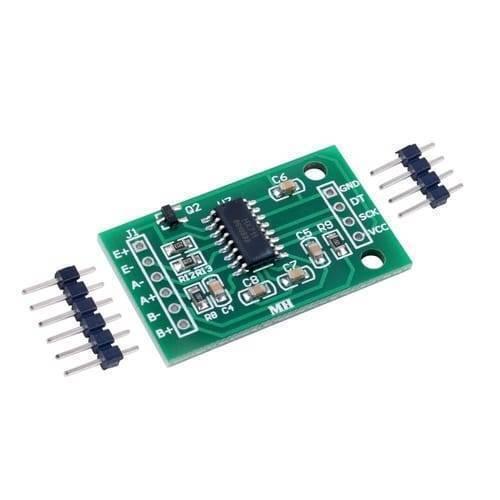 HW29 Hw 29 HX711 Weighing Sensor Load Cell Amplifier Module Analog To Digital Converter Pressure Sensor - a green rectangular circuit board with a central chip, two header pin strips, and labeled port holes.