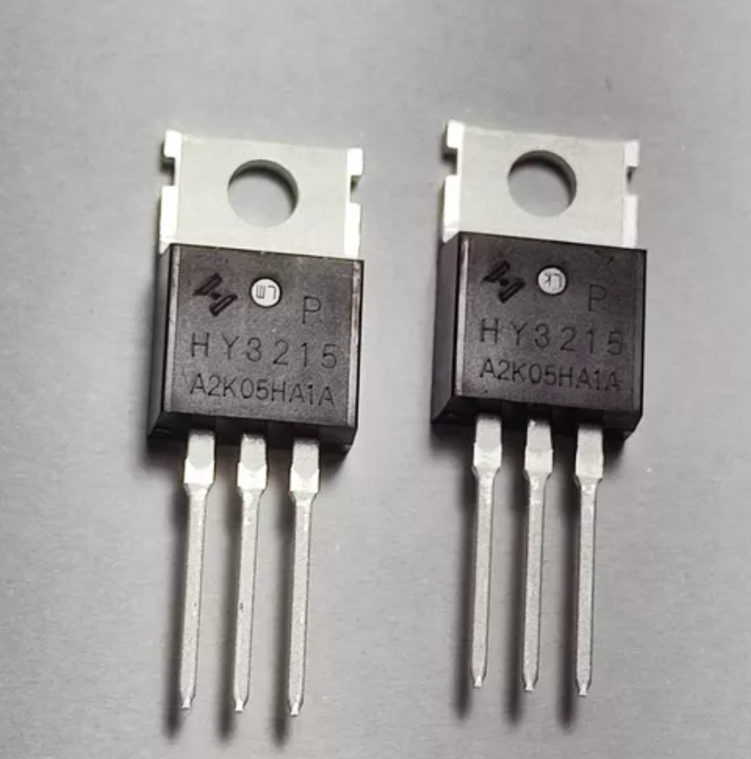 HY3215 MOSFET T0-220 | High-efficiency N-channel Power Transistor For Fast Switching Applications ( REFURB ) - two black N-channel power transistors with three metal pins and a mounting hole, shown against a plain grey background.