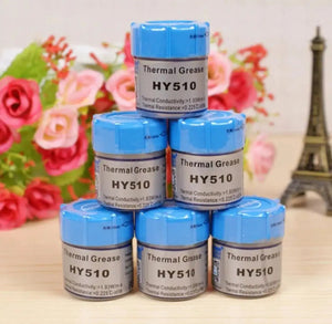 HY510 10G Heat Sink Thermal Paste Thermal Conductive Grease Paste Thermal Grease - shown as a stack of six small grey jars with blue screw-on lids, featuring labels with technical specifications.