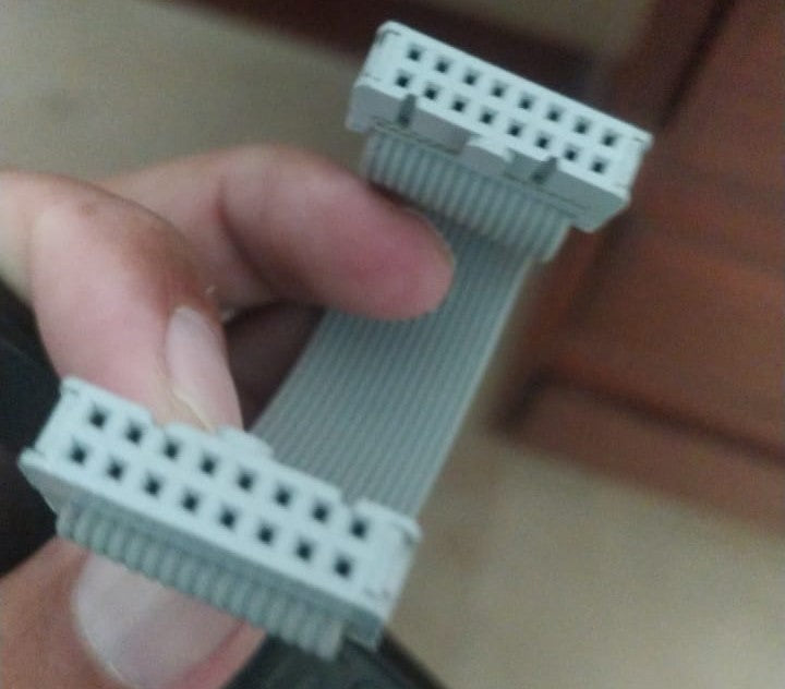 IDC/ide 16PIN Flat Ribbon Cable With IDC Connector - shown as a grey, multi-wire ribbon cable with a 16-pin IDC connector attached to each end.