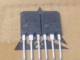 IGBT P75V120FDB2 - a close-up view of two identical black, three-pin electronic power transistors with model markings printed on their front surfaces.