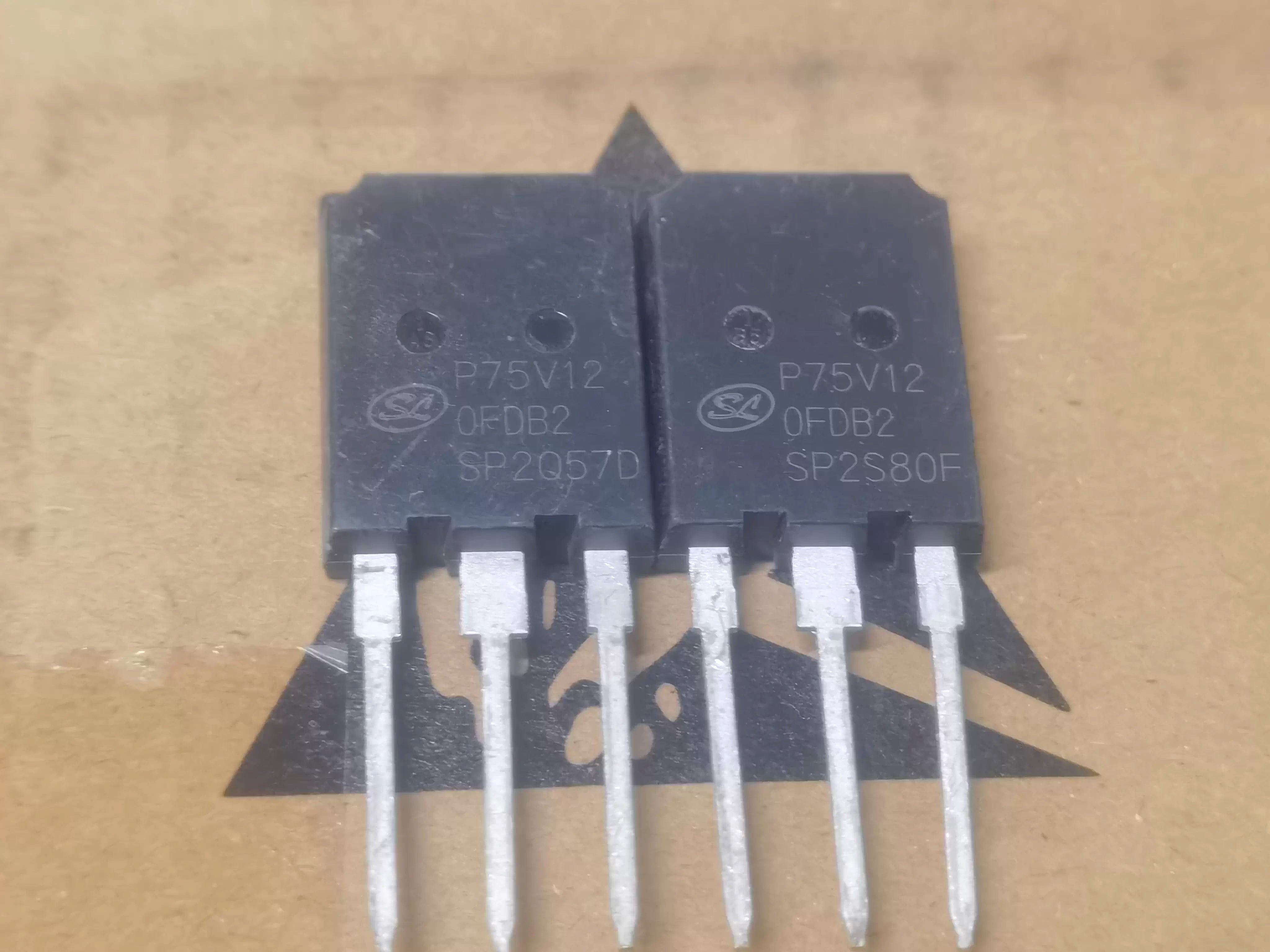IGBT P75V120FDB2 - a close-up view of two identical black, three-pin electronic power transistors with model markings printed on their front surfaces.