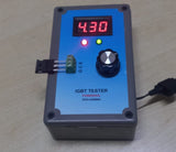 IGBT Tester - in a grey rectangular box with a blue faceplate, featuring a digital display showing 4.30, a rotary knob, two indicator lights, and a terminal.