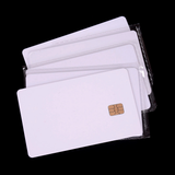 White PVC RFID cards with visible contact chip on black background