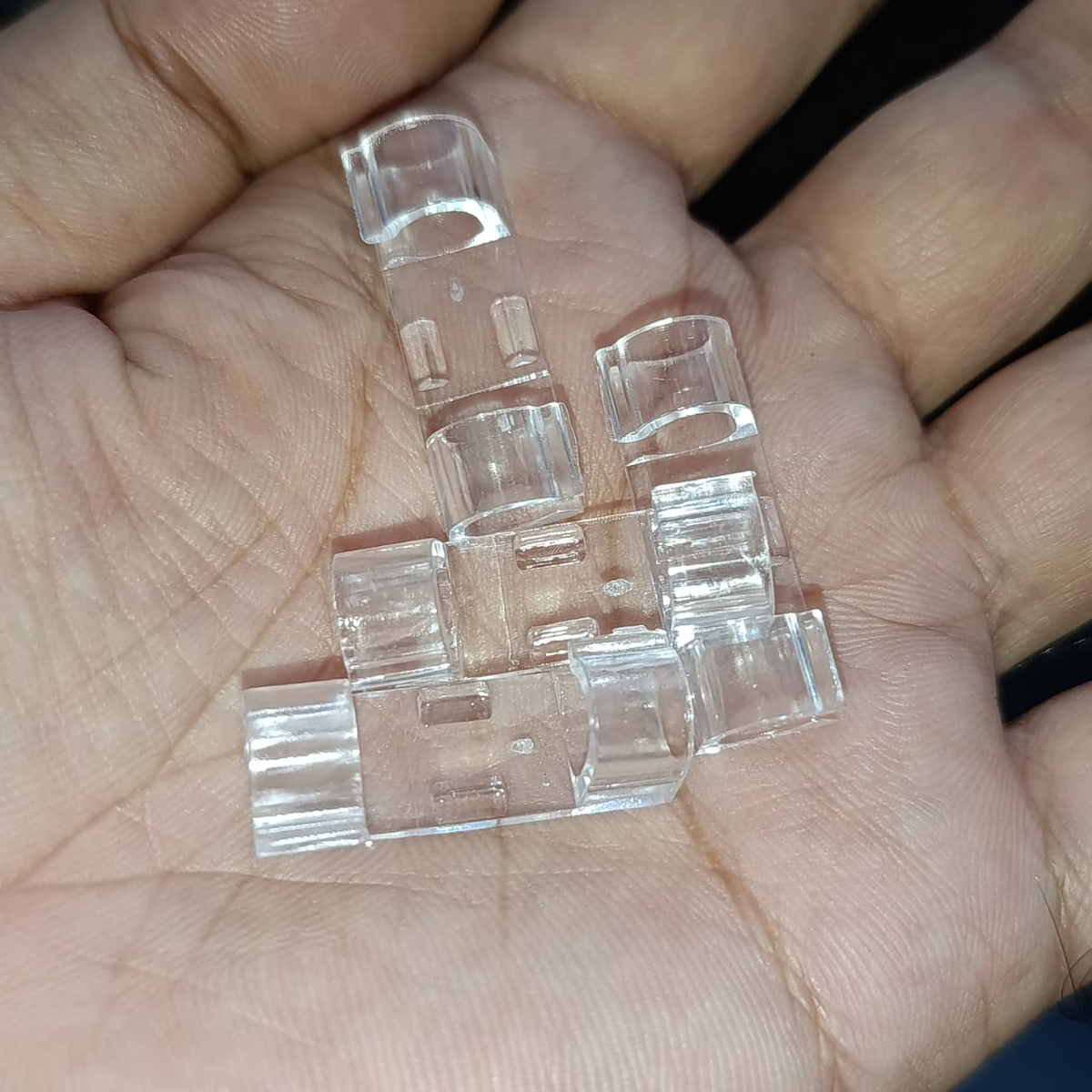 Close-up view of transparent cable organizer clips