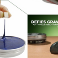 Incredible Magnetic Putty Tin Pack - STEM Science Experiment Toy - blue and dark grey putty being stretched and pulled by magnets held by hands.