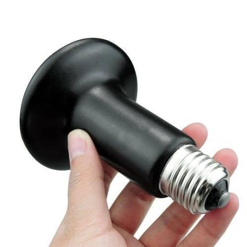 Infrared Ceramic Heating Bulb 200W 220V Best Heating Element Light For DIY Egg Incubator Reptile Pets - a black, mushroom-shaped ceramic heating element with a standard metal screw base held in a person's hand.