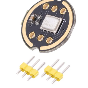 INMP441 Mems High Precision Omnidirectional Microphone I2s Snr Low Power Module - a round black circuit board with a central metal sensor and two separate three-pin yellow header connectors.