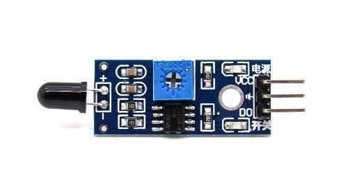 IR Flame Sensor Module - a blue rectangular circuit board with a black sensor, a blue potentiometer, an IC chip, and three output pins.