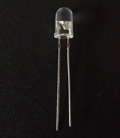 IR Transmitter LED 5mm Infrared Transmitter - a clear, dome-shaped LED component with two long metal leads against a black background.