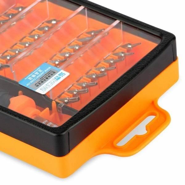Jakemy 32 In 1 Multifunctional Screwdriver Set Tool Kit Jm-8100 For Mobile Phone Pc Repair - a close-up of the orange and black plastic storage case showing internal compartments with various screwdriver bits.