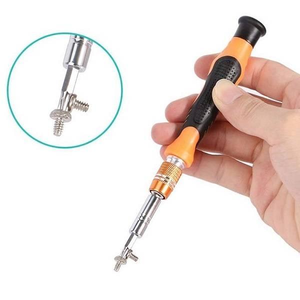 Jakemy 54 In 1 Mini Bits Screwdriver Set Repair Tool Kit Jm-8125 For Cell Phone Tablet Pc Macbook Electronics - a hand holding an orange and black screwdriver handle with an extension bit holding a small metal screw.