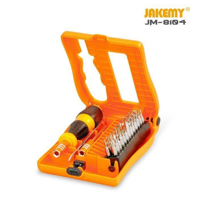 Jakemy Jm-8104 29 In 1 Professional Multifunctional Screwdriver Set - an open orange plastic case containing a yellow and black screwdriver handle and multiple metal bits.