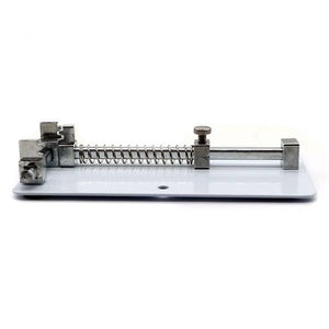 Jakemy Mobile Phone Motherboard Circuit PCB Board Holder Clamp Stand JM-Z15 - shown from the side, featuring a silver metal spring-loaded clamping mechanism.