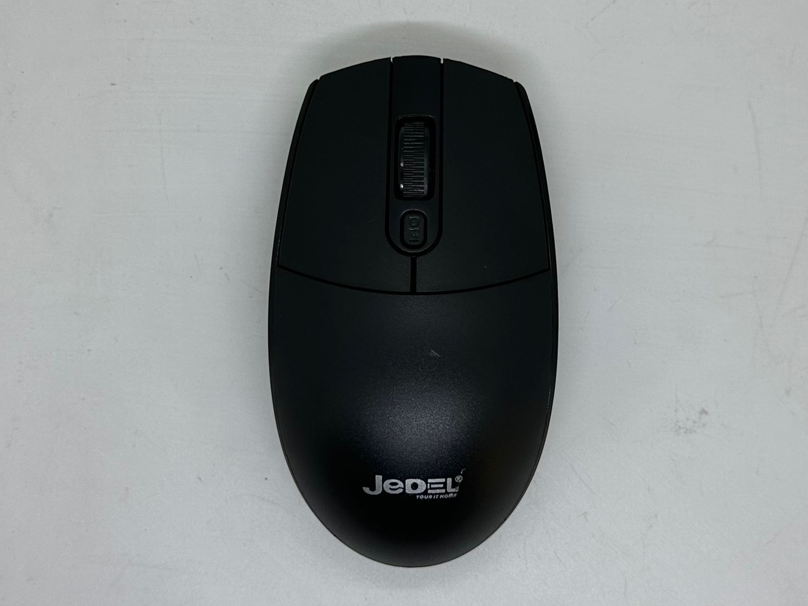 Jedel W927 2.4GHz Wireless Mouse – Optical, Nano Receiver, 10M Range - a black, oval-shaped optical mouse with a scroll wheel and a DPI button, shown from a top-down perspective.