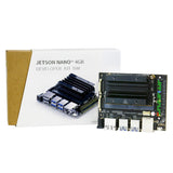 Jetson Nano 4GB B01 Developer Kit - shown with its black circuit board featuring a heatsink and USB ports, positioned next to its white and brown cardboard box.