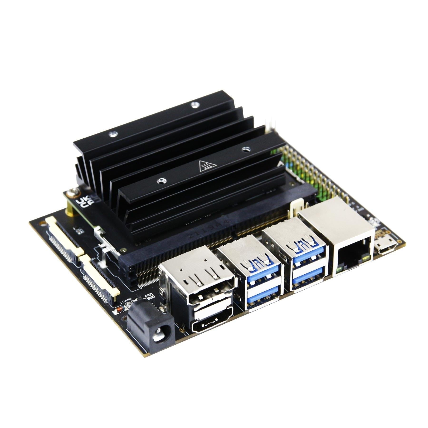 Jetson Nano 4GB B01 Developer Kit - a black heatsink mounted on a circuit board with USB ports, an Ethernet port, and a power jack.