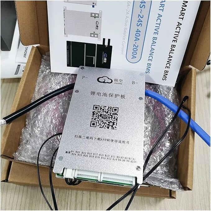 Jk 8s 60A BMS 400mA Active Balancing Smart Battery Management System - with a silver metal module, QR code, and attached cables.
