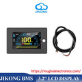 Jk Smart BMS Jikong 3.2 Inch Screen LCD Display Monitor - a 100% battery status screen, alongside a black connection cable with a white multi-pin connector.