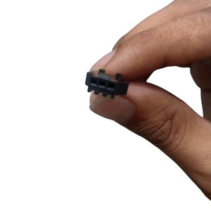 JST Sm 3 Pins Plug Male And Female Wire Connector - a close-up of a black 3-pin connector housing held between fingers.