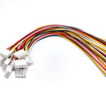 JST Xh 2.54 4 Pin Connector Wire - a bundle of white four-pin connectors with multi-coloured wires extending to the right.
