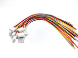 JST Xh 2.54 4 Pin Connector Wire - a bundle of white four-pin connectors with multi-coloured wires extending to the right.