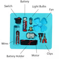K130 Discover The Magic Of Electricity: DIY Kids Science Circuit Kits - a light blue tray containing a battery, motor, fan, switch, wires, and clips.