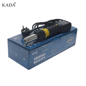 Kada 835D Hot Air Gun SMD Rework Station Thermo Control Anti Static Portable SMD Rework Station - a black and yellow portable tool with a digital display and power cord, resting on its blue product box.