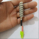 Kada 850 2W Hot Air Heating Element Replacement With 2 Wire - wires, showing the white ceramic heating coil, black heat shrink tubing, and a yellow connector.