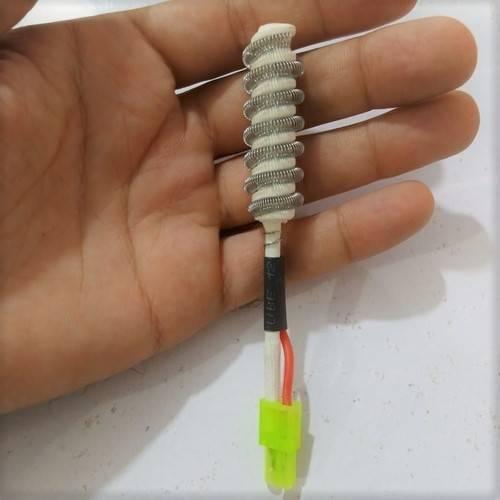 Kada 850 2W Hot Air Heating Element Replacement With 2 Wire - wires, showing the white ceramic heating coil, black heat shrink tubing, and a yellow connector.