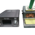 Kada T210D Thermostatic Soldering Station – 75W, Adjustable Temperature 120–450°c, LED Display, Auto Sleep, Pid Control - with a black control unit featuring a display and knob, next to a stand with a brass tip cleaner and yellow sponge.