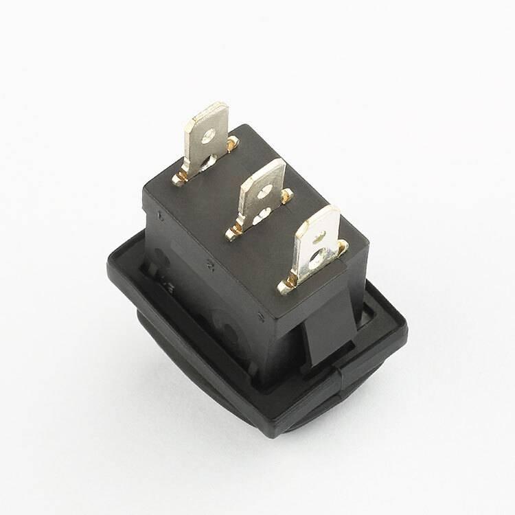 KCD3 Spdt Rocker Switch Waterproof - a black rectangular rocker switch shown from the rear angle with three metal spade terminals protruding from the back.