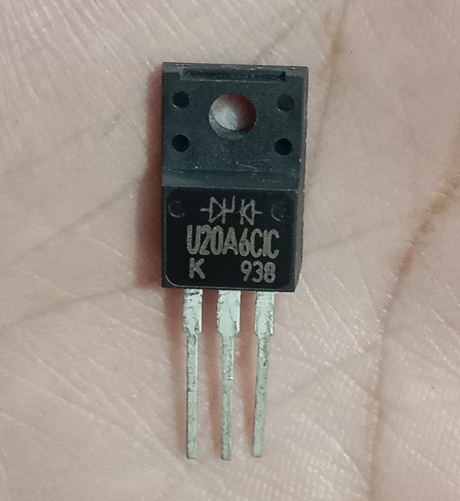 KEC U20A6CIC Ultra Fast Recovery Rectifier Diode (TO-220F) USED - a black three-pin TO-220F component with the model number printed on its face, held in a hand.