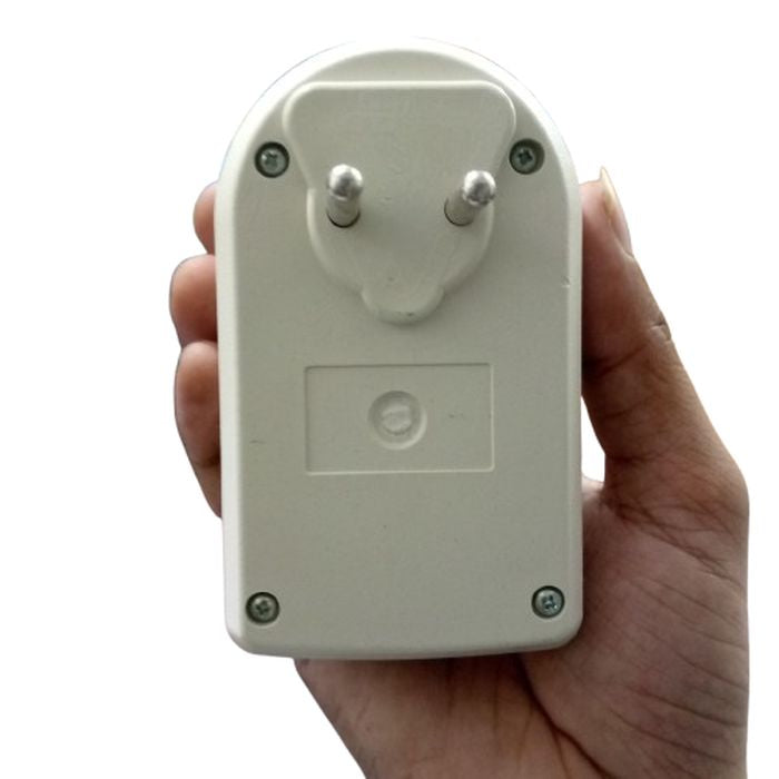 Kent Digital High Low Voltage Protector - shown from the back, featuring a two-pin plug, four mounting screws, and a central circular indentation.