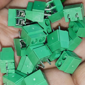 Kf 350 /kf 126 250V 10A 5mm Pitch Green Color 2 Pin Screw Terminal Connector Tblock - shown in a pile held in a hand.