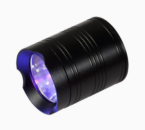Koocu KC-UV1 Smart Curing UV Lamp Light - a black, cylindrical handheld UV flashlight with a purple-tinted lens and a scalloped bezel.