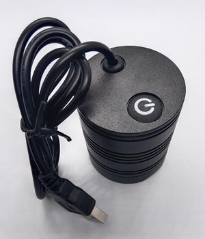 Koocu KC-UV1 Smart Curing UV Lamp Light - a black cylindrical device with a power button on top and an attached USB cable.