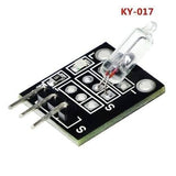 Ky 017 Mercury Medallion Module - a black circuit board featuring a glass mercury switch, a small LED, a resistor, and three metal connector pins.