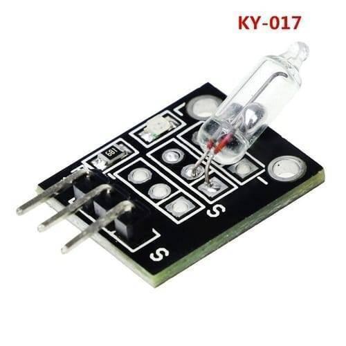 Ky 017 Mercury Medallion Module - a black circuit board featuring a glass mercury switch, a small LED, a resistor, and three metal connector pins.