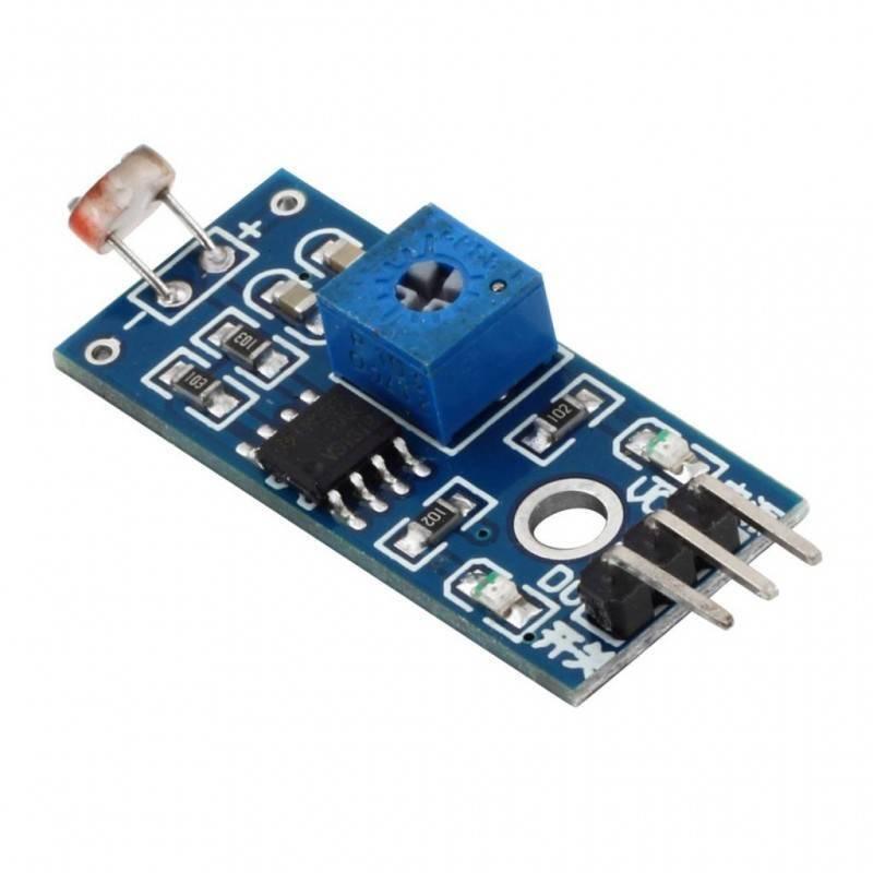 Ky-018 LDR Light Sensor Module - a blue PCB with a photoresistor, a blue potentiometer, an integrated circuit, and a three-pin header connector.